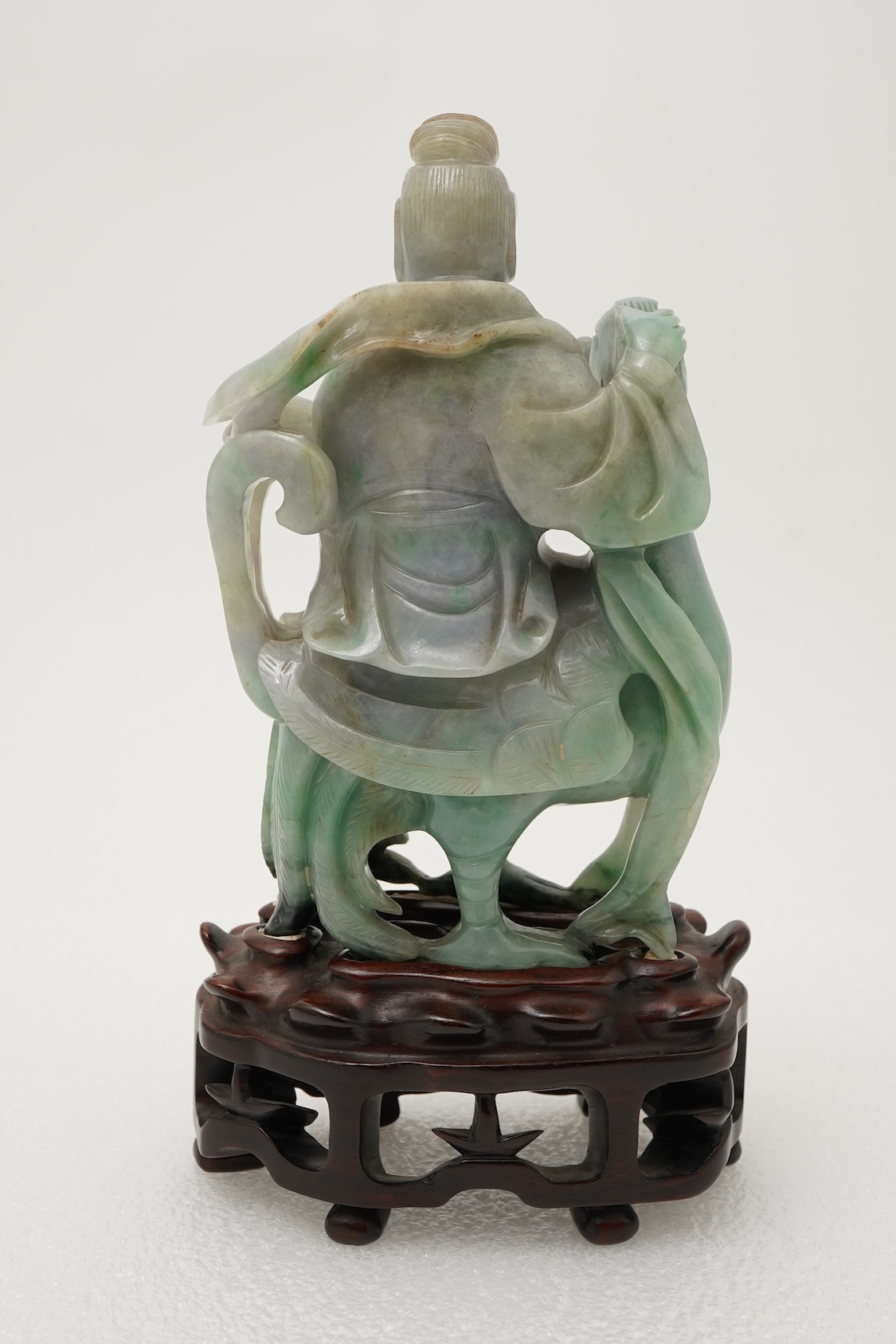 A Chinese jadeite figure of Xi Wangmu riding on a phoenix, late 19th/early 20th century